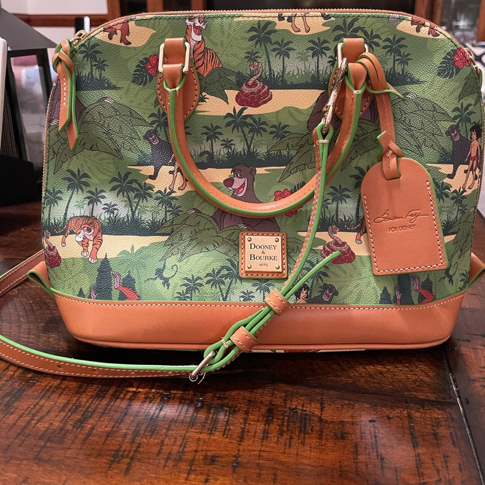 Excellent used condition/new without tags Disney jungle book Dooney and Bourke